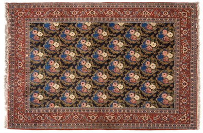 Lot 858 - Tabriz Carpet Persian Azerbaijan The deep indigo field with an allover lattice design of...