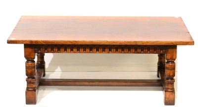 Lot 1118 - A Titchmarsh & Goodwin Oak Coffee Table, of rectangular form with chip carved frieze, raised on...