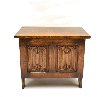 Lot 1120 - A Titchmarsh & Goodwin Oak Miniature Coffer, model RL874/L, hinged lid above two carved panels,...