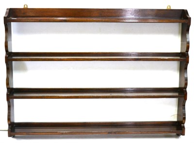 Lot 1128 - A Titchmarsh & Goodwin Reproduction Oak Four-Tier Plate Rack, 122cm wide, 91cm high