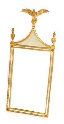 Lot 1134 - A Gilt Mirror in the Regency style, surmounted by an eagle, 122cm by 51cm