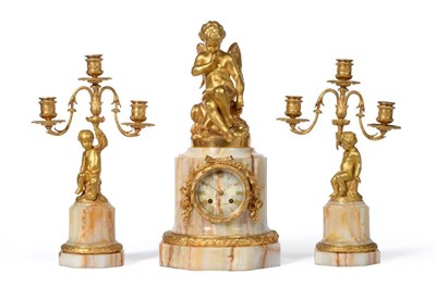 Lot 883 - An Ormolu and Marble Striking Mantel Clock with Garniture, retailed by Roussel, Paris, circa...