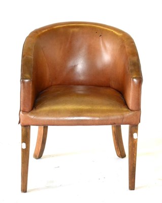 Lot 1156 - A Brown Leather Tub Shaped Armchair, with overstuffed seat, 62cm by 50cm by 83cm