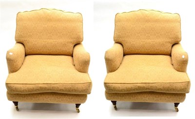 Lot 1160 - A Pair of Feather-Filled Armchairs of recent date, labelled Recline &amp; Sprawl, upholstered...