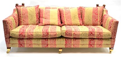 Lot 1167 - A Duresta Three-Seater Sofa, upholstered in green and pink floral striped damask, with four scatter