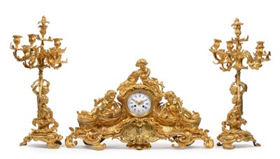 Lot 898 - A Good Ormolu Striking Mantel Clock with Garniture, circa 1880, the elaborate case surmounted...