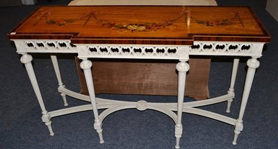 Lot 1003 - A Satinwood, Floral Painted and Rosewood Crossbanded Breakfront Side Table, of recent date, the top