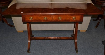 Lot 1022 - A Reproduction Burr Walnut and Crossbanded Sofa Table, of recent date, the two drop leaves...
