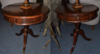 Lot 1029 - A Pair of Reproduction Walnut Drum Style Circular Lamp Tables, the crossbanded tops above a...