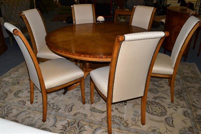 Lot 1048 - A Bevan & Funnell Santos Model Oak and Crossbanded Circular Dining Table, of recent date, raised on