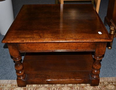 Lot 1056 - A Titchmarsh & Goodwin Oak Coffee Table, of square form, with single frieze drawer, raised on...