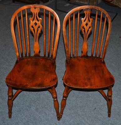 Lot 1061 - A Set of Six Titchmarsh & Goodwin Oak Windsor Back Dining Chairs, with pierced splats, spindle back