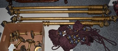 Lot 1076 - A Set of Four Gilt Composition Curtain Poles, with acanthus decorated finials, 190cm wide; A Set of