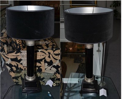 Lot 1088 - A Pair of Modern Ebonised and Polished Metal Column Table Lamps, with black velvet shades and...