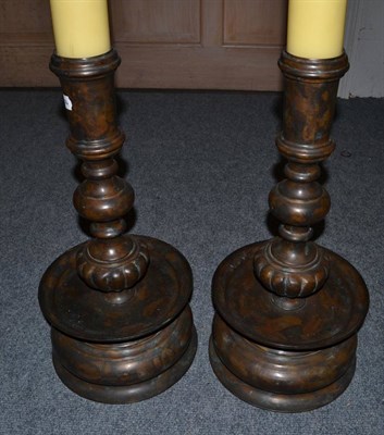 Lot 1117 - A Pair of Maitland & Smith Ltd Bronzed Effect Metal Capstan Style Candlesticks, with knopped...