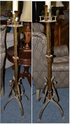 Lot 1120 - A Pair of Gilded Metal Wrought Iron Candlesticks, in 17th century style, raised on four splayed...