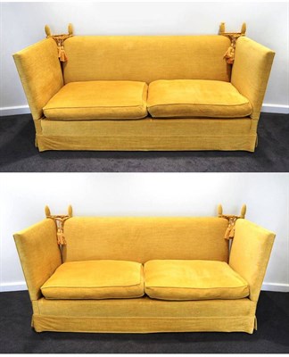 Lot 1123 - A Pair of Feather Filled Knole Sofas, upholstered in yellow corduroy fabric, with two drop ends and