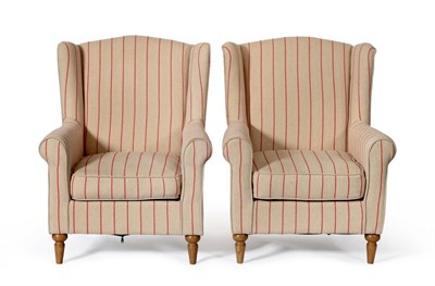 Lot 1134 - A Pair of Modern Wing Back Feather Filled Armchairs, upholstered in beige and red striped...