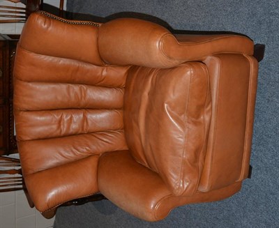 Lot 1143 - A James Brindley of Harrogate Sheridan Easy Chair, of recent date, upholstered in brown...
