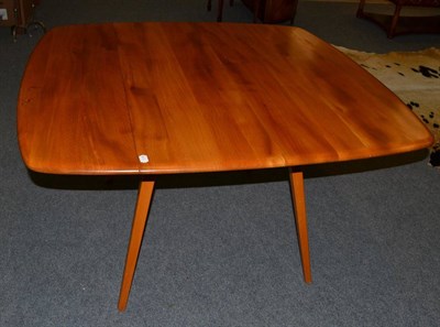 Lot 1150 - An Ercol Light Elm Dropleaf Dining Table, unmarked, raised on square tapering legs, 112cm by...