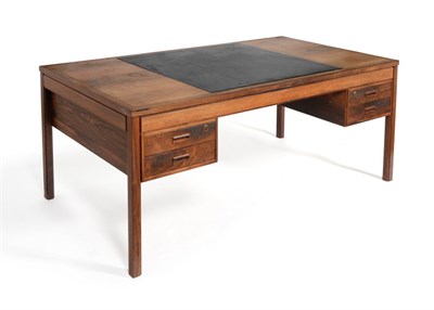 Lot 1156 - A 1960's Danish Rosewood Desk, the rectangular top with inset black skiver, above two banks of...