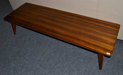 Lot 1162 - A 1950's Vanson Teak Rectangular Coffee Table, on square tapering legs, 139cm by 46cm by 30cm