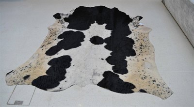 Lot 1170 - Nguni Cow Hide (Bos taurus), modern, excellent quality A grade black and white dappled cow hide...