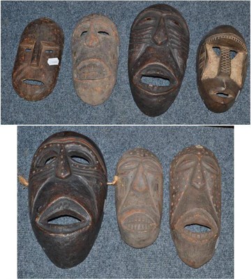 Lot 1192 - Five Pende Dance Masks, Congo, each with wrinkly face and dotted decoration; Two Similar Masks (7)
