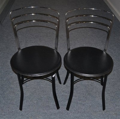 Lot 1202 - A Set of Six Italian Contemporary Dining Chairs, with steel tubular backs above circular black...