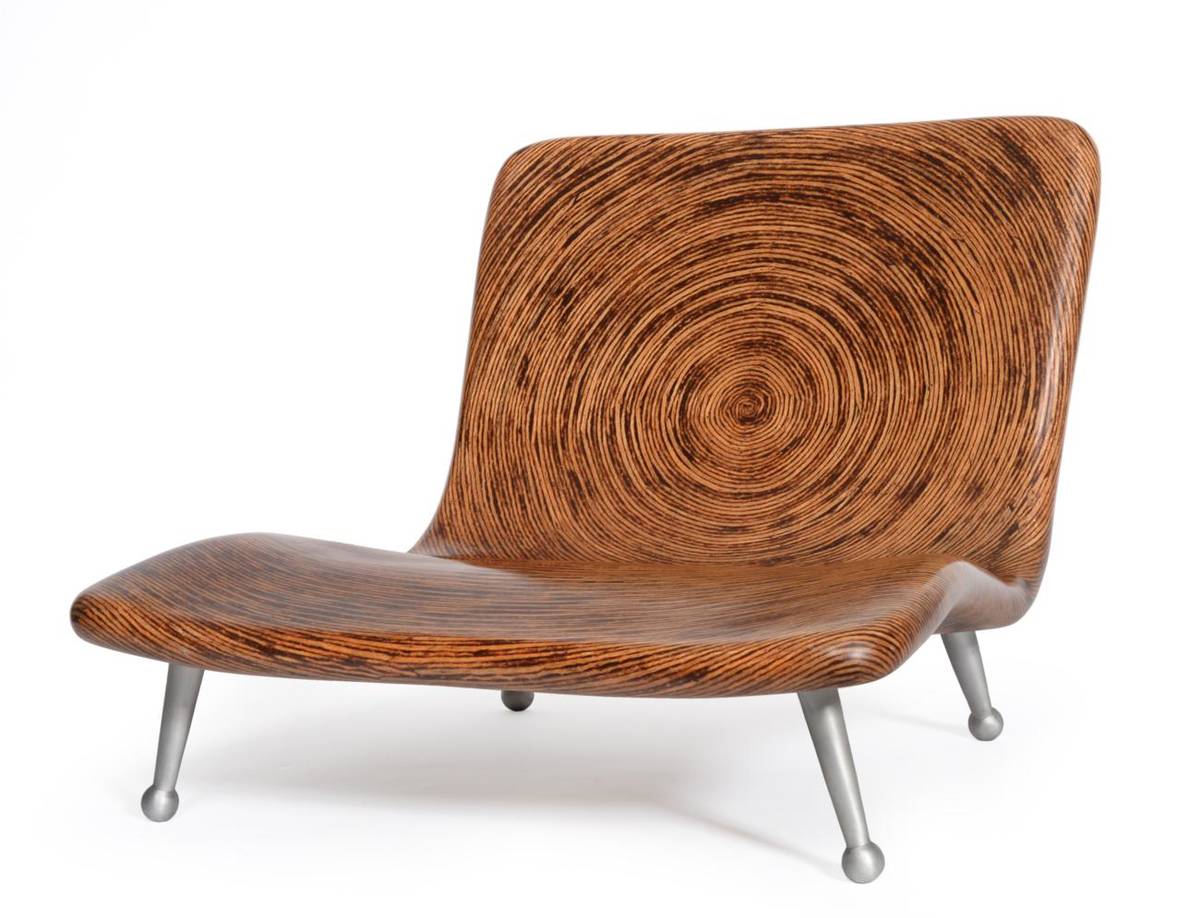 Lot 1221 - A Clayton Tugonon Low Rider Chair, of