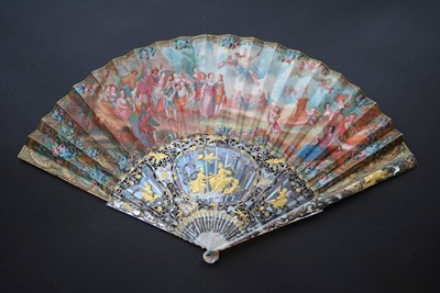 Lot 256 - The Wedding Procession: A Colourful Mid 18th Century Fan, with highly gilded mother-of-pearl...