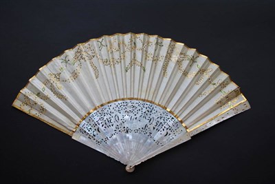 Lot 257 - An Elegant Mid-18th Century Fan, mounted on carved and pierced mother-of-pearl sticks, the...