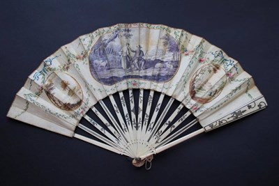 Lot 269 - The Discussion: An 18th Century Bone (?) Fan, with simple gilding and silvering to the monture....
