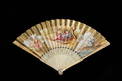 Lot 276 - An Early 18th Century Ivory Fan, the guards carved and pierced with a lady holding her arm...