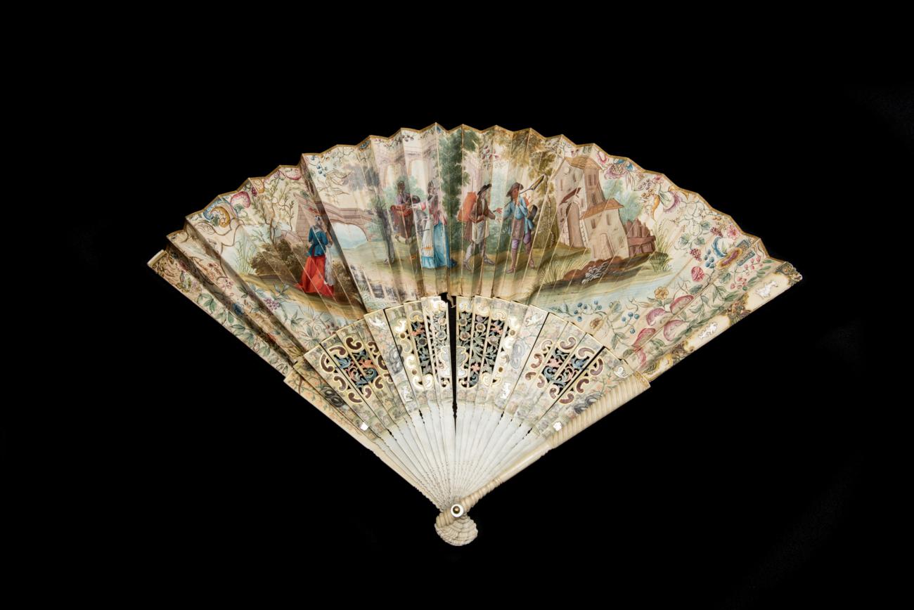 Lot 300 - The Pedlar: An 18th Century Ivory Fan, possibly Italian, with carved and inlaid guards and...