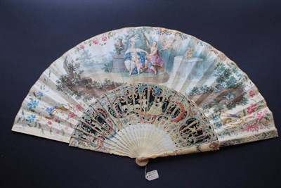 Lot 311 - Paris and Oenone: A Mid-18th Century Ivory Fan, the sticks carved, pierced and painted in...