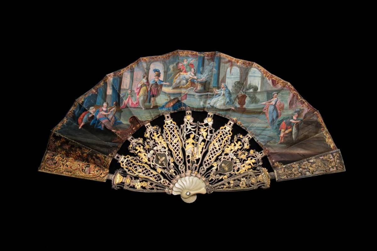 Lot 322 - Anthony and Cleopatra: An 18th Century Ivory Fan, with extravagant monture, the heavy sticks carved