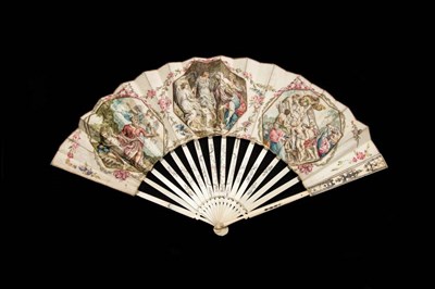 Lot 323 - A Rare Late 18th Century Ivory Fan, the leaf of vellum mounted à l'anglaise, the guards and sticks