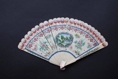 Lot 329 - A 19th Century Bone Brisé Fan, the twenty-four inner sticks and two guards painted recto/verso...