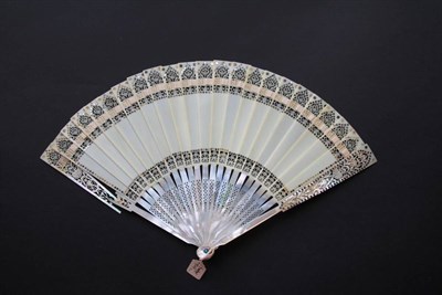 Lot 330 - A Mother-of-Pearl and Ivory Fan, circa 1900(?), of a very unusual type. The monture is made up...