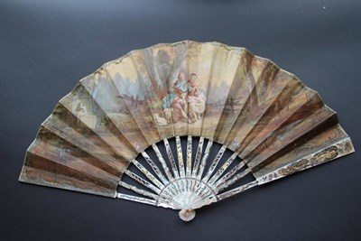 Lot 337 - Sharing a Picnic: A Mid-18th Century Mother-of-Pearl Fan, the monture carved and pierced,...