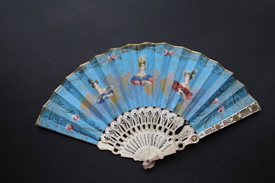 Lot 339 - An Early 19th Century Fan, with pierced bone sticks, a peephole feature to all the sticks half...