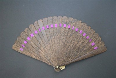 Lot 353 - An Early 19th Century Wooden Brisé Fan, cut to make the very best of a distinctive grain, possibly
