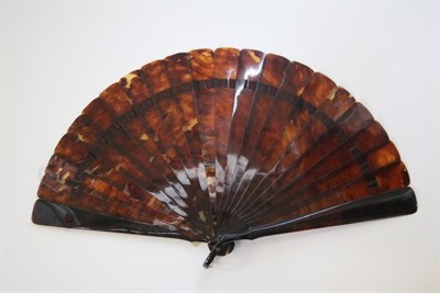 Lot 356 - A Circa 1860's to 1880's Tortoiseshell Brisé Fan, the plain sticks quite wide and very softly...
