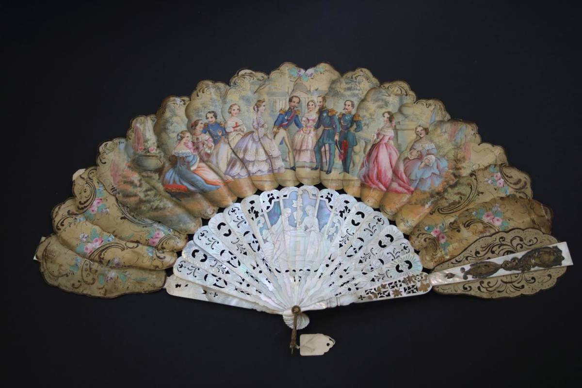 Lot 374 - A Mid-19th Century Silk Jenny Lind or Palmette Fan, the palm shaped leaf sections linked...