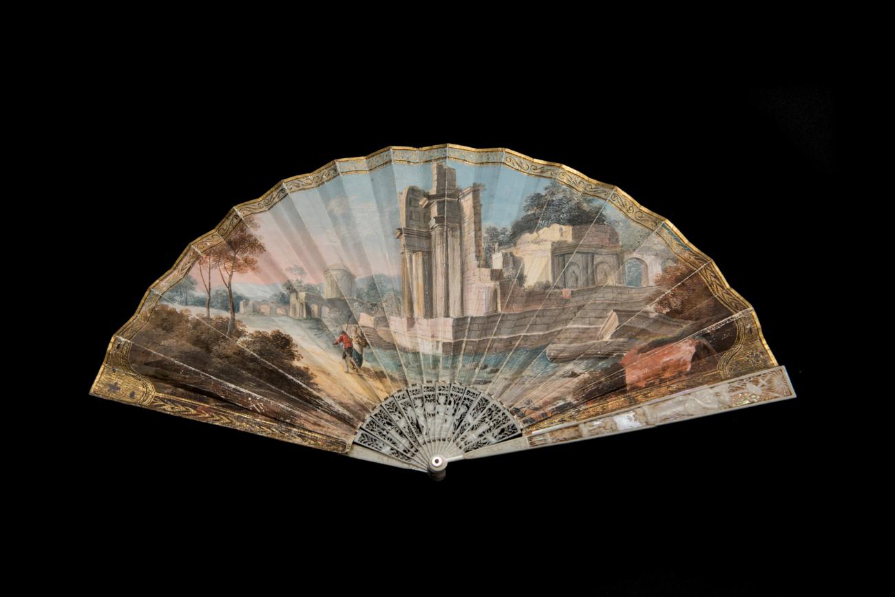 Lot 375 - A Regency Grand Tour/Topographical Fan, circa 1800 -1810, depicting Roman temple ruins in a...