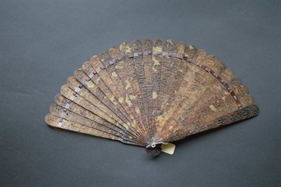 Lot 377 - A Fine Chinese Tortoiseshell Brisé Fan, Qing Dynasty, circa 1830-40, carved throughout with...