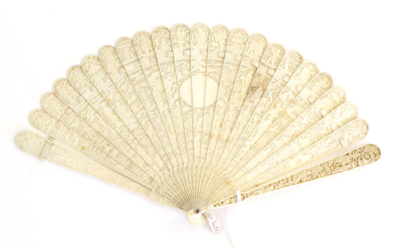 Lot 383 - A Circa 1830's to 1840's Chinese Carved Ivory Brisé Fan, Qing Dynasty, a central oval left...