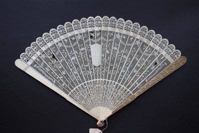 Lot 388 - A Circa 1790 Finely Carved and Pierced Chinese Ivory Brisé Fan, Qing Dynasty, with a plain central