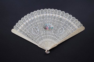 Lot 389 - An Early 19th Century Finely Carved Chinese Ivory Brisé Fan, Qing Dynasty, the central oval...